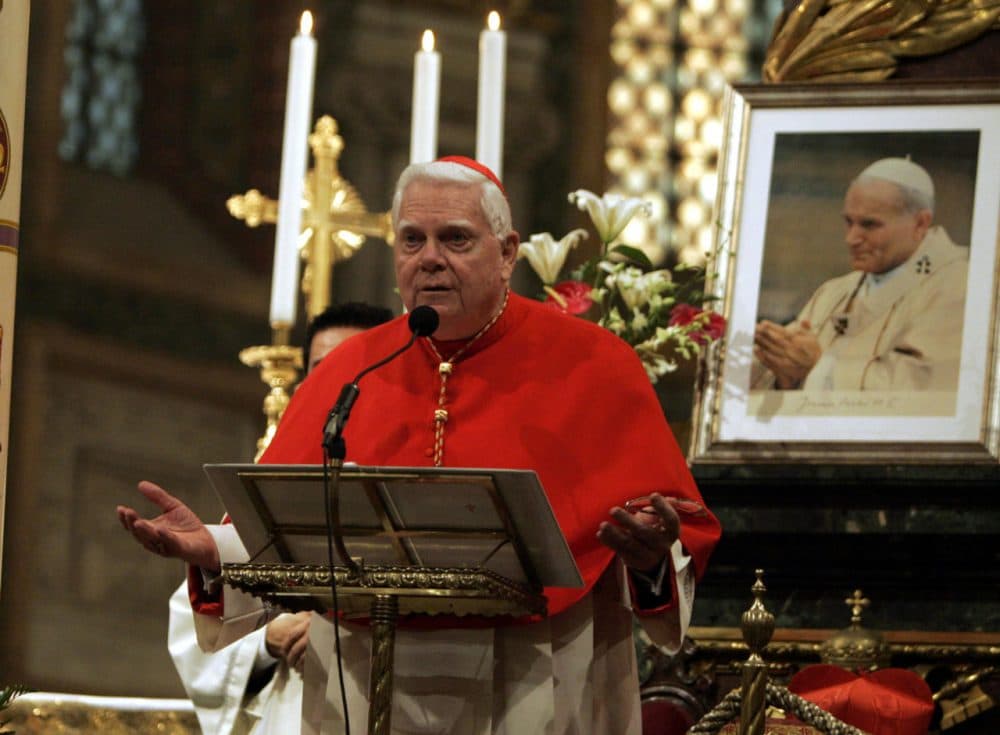 Cardinal Bernard Law leads a Mass celebrated in the Pope John Paul II's memory, at the St. Mary Major Basilica in Rome in 2005. Cardinal Law resigned in disgrace as archbishop of Boston over his role in the clergy sex abuse crisis. He died Dec. 20, 2017. (Luca Bruno/AP)