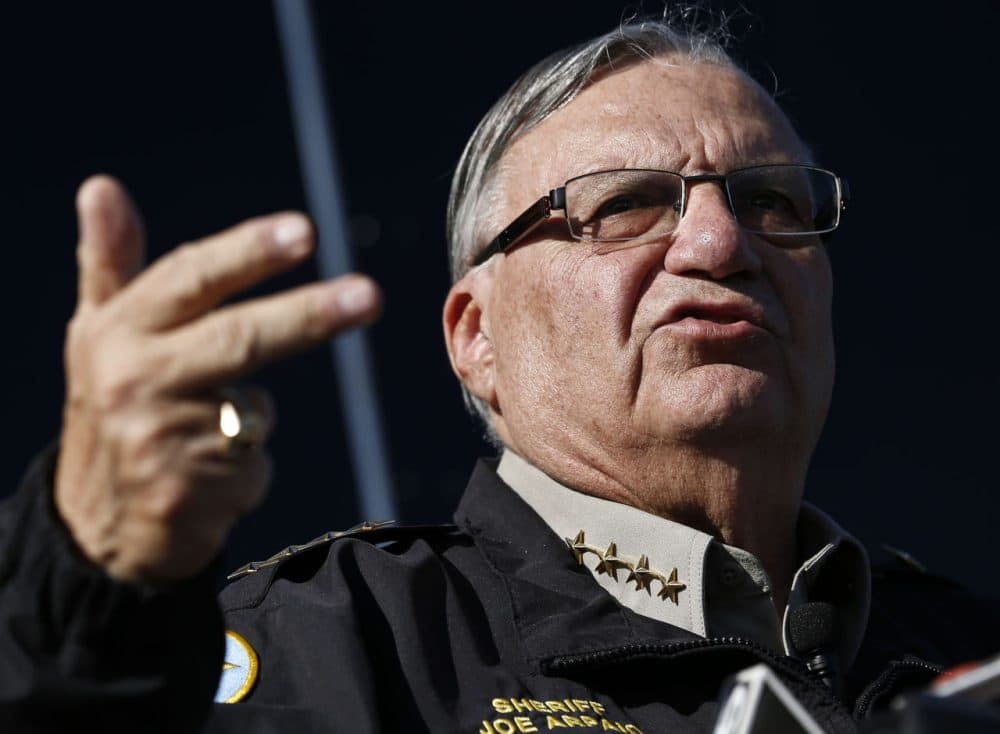 Maricopa County Sheriff Joe Arpaio speaking with the media in Phoenix in 2013. Arpaio, known for his political defiance is back in the spotlight as he undergoes a second round of contempt-of-court hearings for his acknowledged disobedience of a judge's orders in a racial profiling case that centered on his signature immigration patrols. (Ross D. Franklin/AP File)