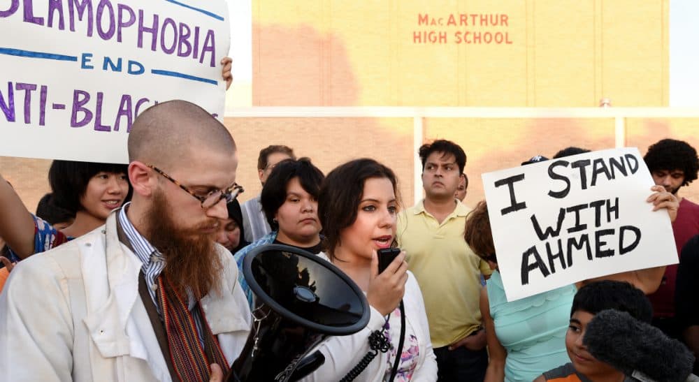 We hear the story of a 14-year-old Muslim boy arrested for bringing his homemade clock to his Texas high school, and we want to think, 'That's just Texas.' If only that were true. Pictured: Protesters at a prayer vigil in support of Ahmed Mohamed, Thursday, Sept. 17, 2015, in Irving, Texas. (Jeffrey McWhorter/AP)