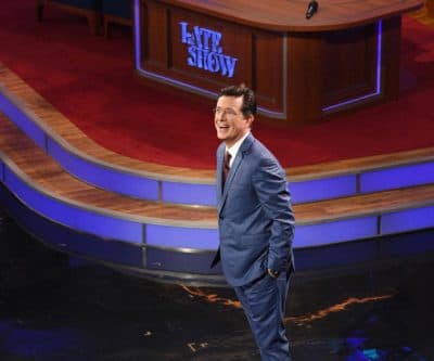 Stephen Colbert hosts the premiere episode of &quot;The Late Show,&quot; Tuesday Sept. 8, 2015, in New York. Actor George Clooney and Republican presidential candidate Jeb Bush were the guests for Colbert's debut. (Jeffrey R. Staab/CBS via AP)