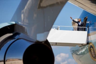 President Barack Obama boards Air Force One at Andrews Air Force Base, Md., Wednesday, Sept. 9, 2015, to travel to Selfridge Air National Guard Base, Harrison Township, Mich. with second lady Dr. Jill Biden. (AP)