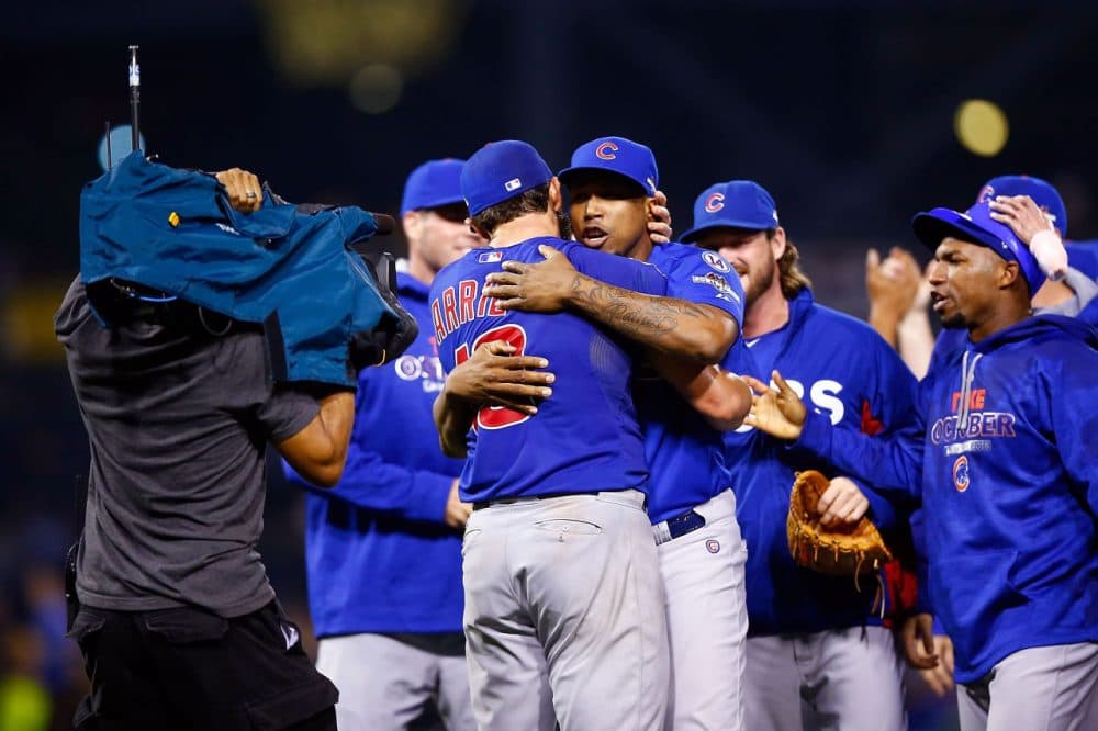 Jake Arrieta #49 of the Chicago Cubs celebrates with teammates after defeating the Pittsburgh Pirates to win the National League Wild Card game at PNC Park on October 7, 2015 in Pittsburgh, Pennsylvania. The Chicago Cubs defeated the Pittsburgh Pirates with a score of 4 to 0. (Jared Wickerham/Getty Images)