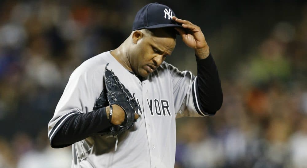 New York Yankees starting pitcher CC Sabathia adjusts his cap after allowing a run and walking two batters in the first inning of a baseball game against the New York Mets in New York, Sunday, Sept. 20, 2015. (Kathy Willens/ AP)
