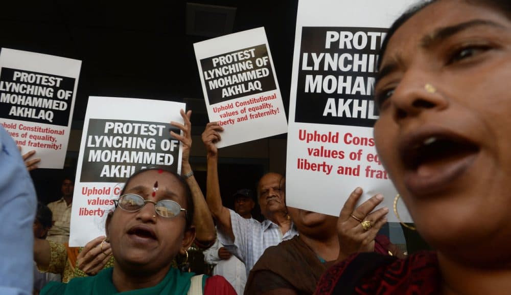 Indian protesters shout slogans during a demonstration to condemn the lynching and murder of an Indian Muslim, in Mumbai on October 6, 2015. Mohammad Akhlaq, 50, was dragged from his house September 29, 2015 on the outskirts of the capital New Delhi and attacked by a Hindu mob over rumors that he had stored and eaten beef.  (Indranil Mukherjee/AFP/Getty Images)