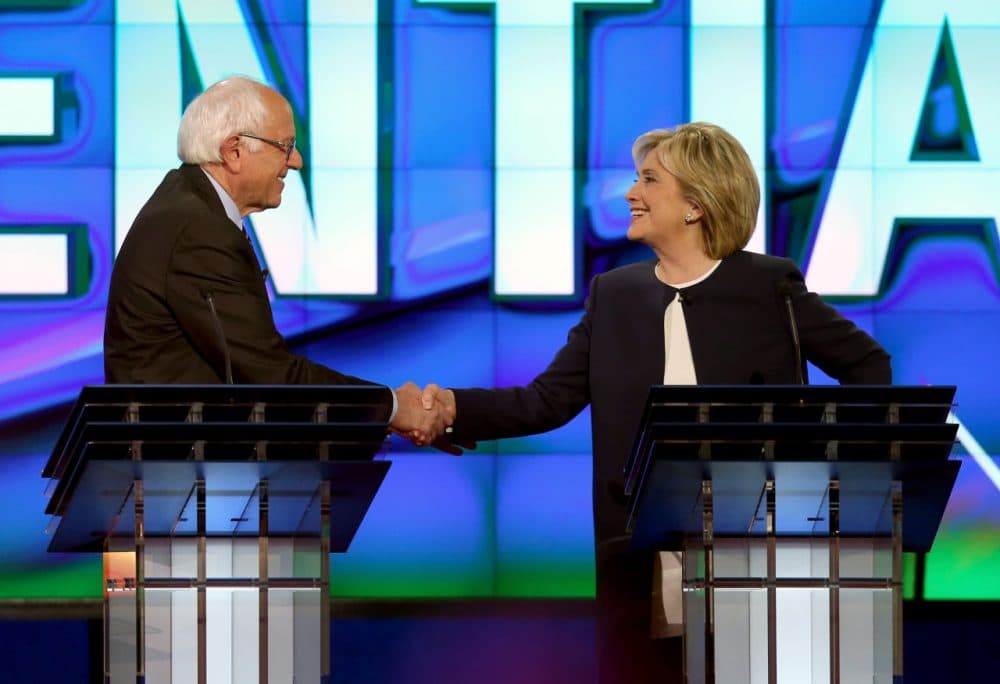 Democratic presidential candidates U.S. Sen. Bernie Sanders (left) and Hillary Clinton shake hands at the end of a presidential debate sponsored by CNN and Facebook at Wynn Las Vegas on October 13, 2015 in Las Vegas, Nevada. Five Democratic presidential candidates participated in the party's first presidential debate.  (Joe Raedle/Getty Images)