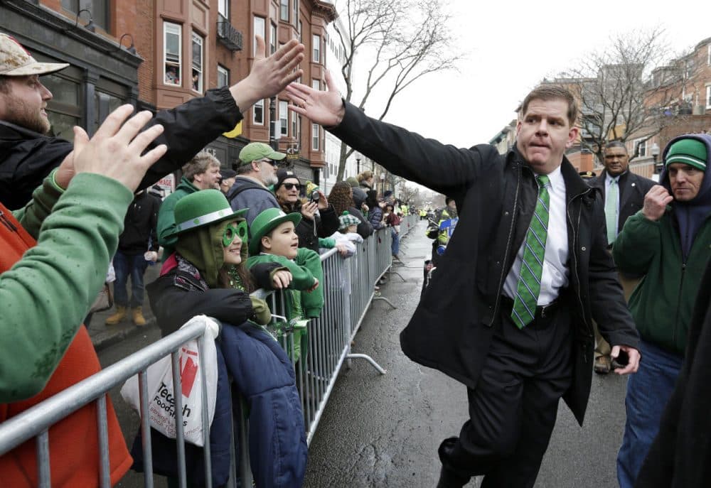 Boston Mayor Marty Walsh greeting St. Patrick's Day Parade spectators in March. (Steven Senne/AP)