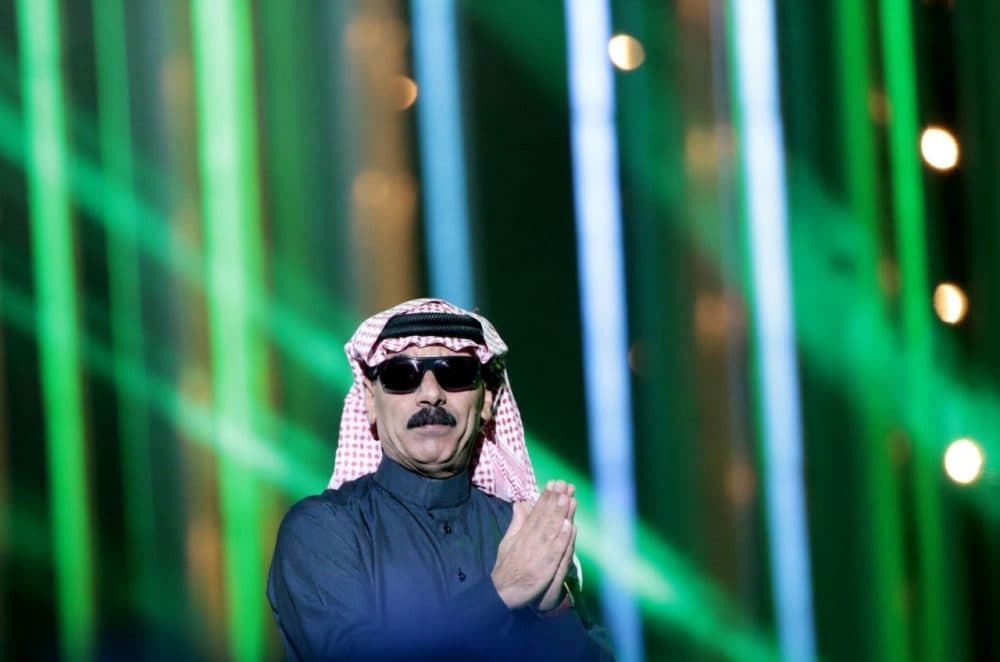 Syrian singer Omar Souleyman performs during the Nobel Peace Prize concert in Oslo, Norway on December 11, 2013. (Daniel Sannum Lauten/AFP/Getty Images)
