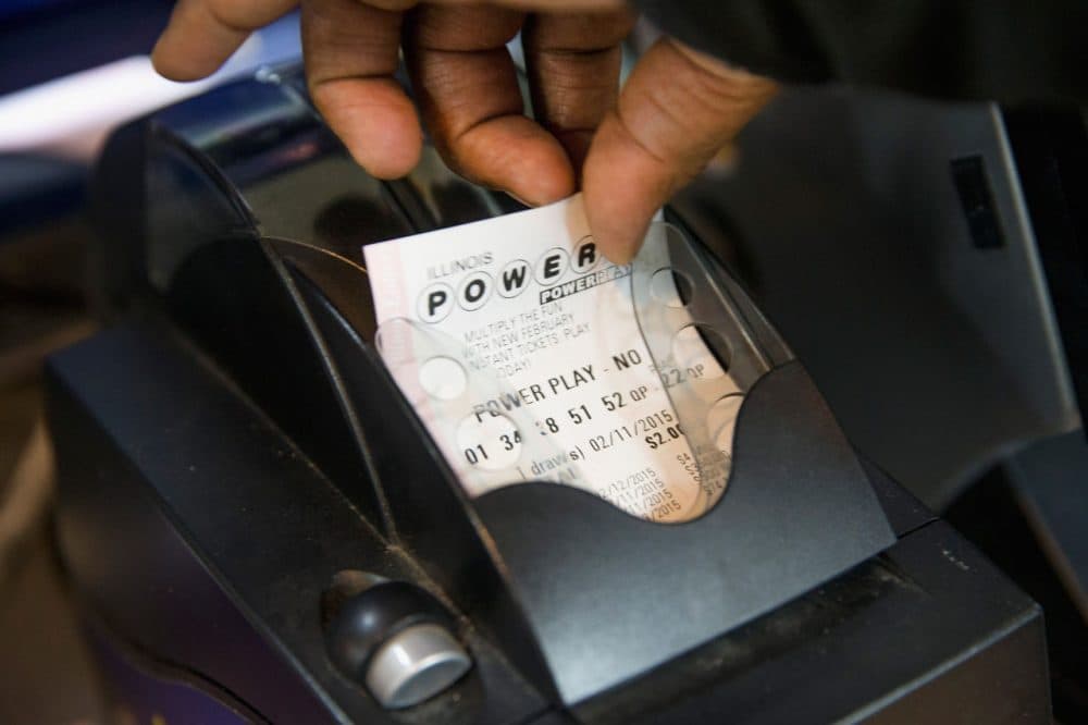 A Powerball lottery ticket is printed for a customer at a 7-Eleven store on February 11, 2015 in Chicago, Illinois. (Scott Olson/Getty Images)