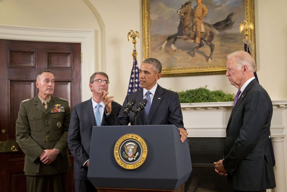 President Barack Obama, accompanied by, from left, Joint Chiefs Chairman Gen. Joseph Dunford, Defense Secretary Ash Carter and Vice President Joe Biden, answers a questions from a member of the media about Afghanistan, Thursday, Oct. 15, 2015, in the Roosevelt Room of the White House in Washington. Obama announced that he will keep U.S. troops in Afghanistan when he leaves office in 2017, casting aside his promise to end the war on his watch and instead ensuring he hands the conflict off to his successor. (Pablo Martinez Monsivais/AP)