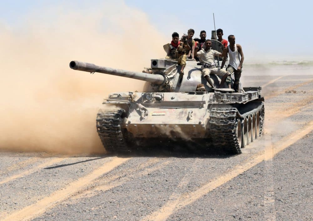 Fighters loyal to Yemeni President Abdrabbuh Mansour Hadi drive a tank in the area of the strategic Bab al-Mandab Strait, in the southern Yemeni province of Taez, on October 1, 2015. Pro-Hadi forces backed by the Saudi-led coalition, seized Bab al-Mandab and Dhubab in Taez province near the strait at the entrance to the Red Sea, from Shiite Huthi rebels, loyalist military official Abedrabbo al-Mihwali told AFP. (Saleh al-Obeidi/AFP/Getty Images)