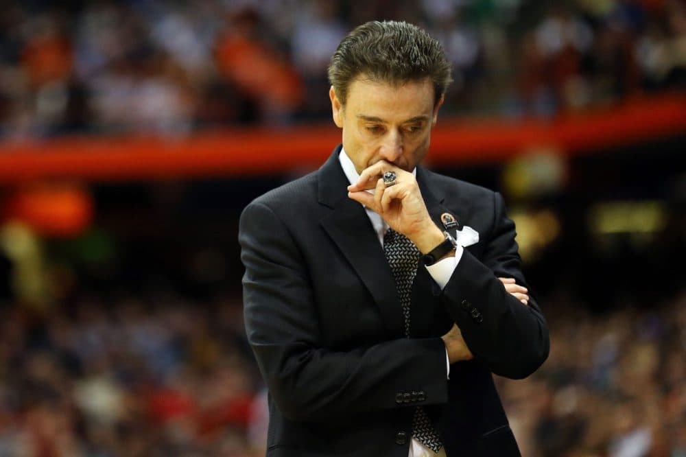 The Louisville Cardinals and head coach Rick Pitino are under scrutiny after anonymous players say their recruitment involved going to parties where their assistant head coach provided strippers. (Maddie Meyer/Getty Images)