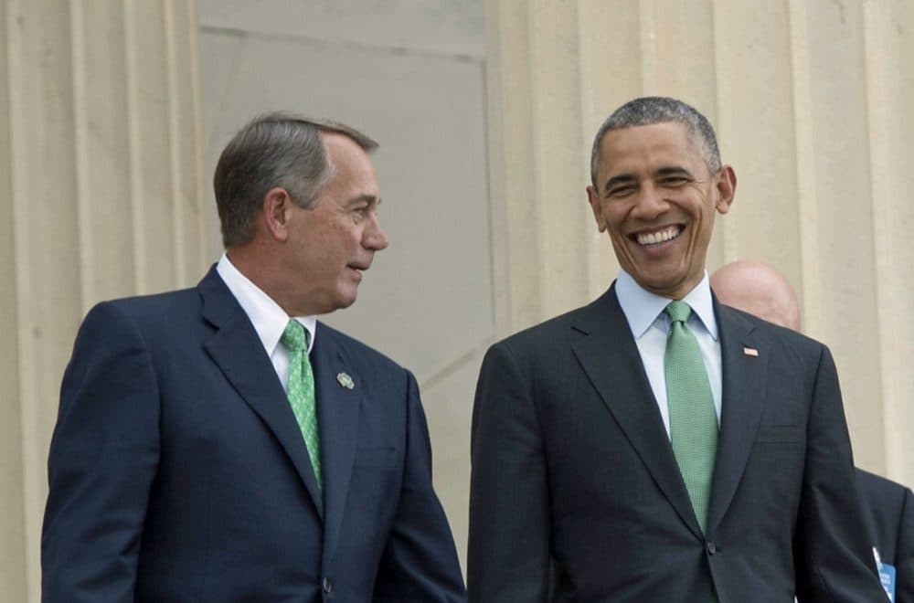 President Barack Obama walks with Speaker of the House John Boehner as they depart the annual Friend's of Ireland luncheon on Capitol Hill in Washington, DC, March 17, 2015. With just seven days remaining until the debt ceiling deadline, Republican congressional leaders and President Obama have reached a tentative budget deal. (Jim Watson/AFP/Getty Images)