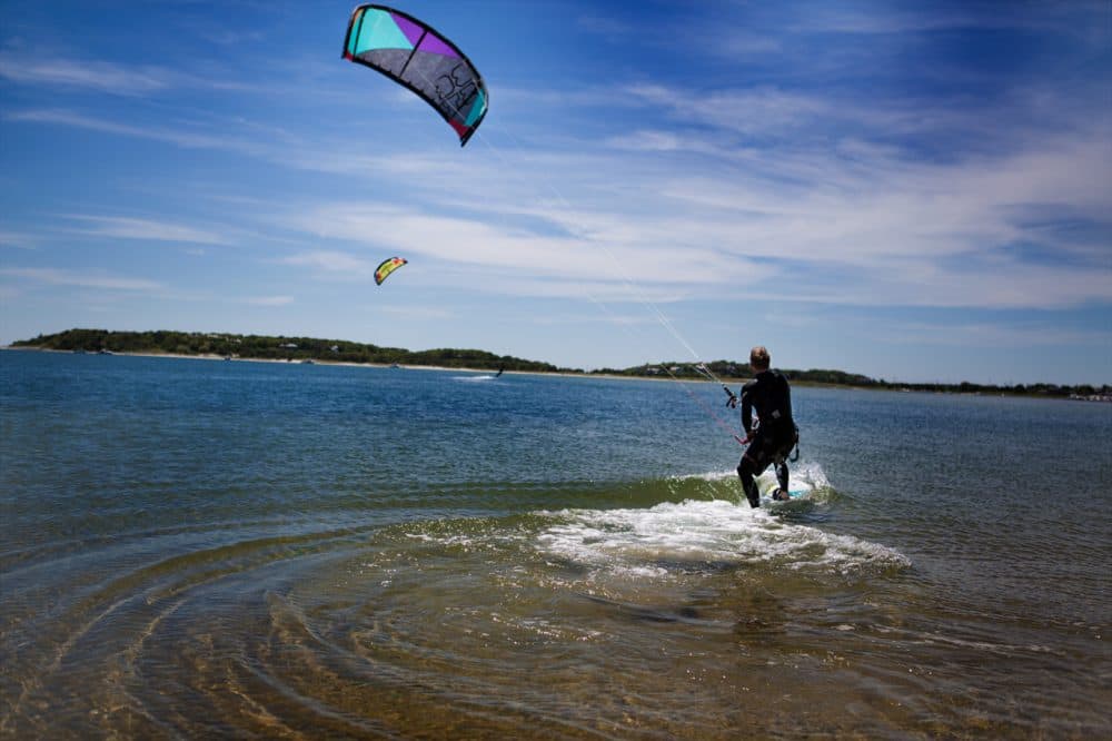 A kiteboarder off the coast of Monomoy. (Jesse Costa/WBUR)