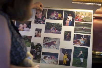 In this Wednesday, Sept. 2, 2015, photo, Dorothy McIntosh Shuemake, mother of Alison Shuemake, browses a picture collage of her daughter at her home, in Middletown, Ohio. Alison Shuemake, 18, died Aug. 26, after a suspected heroin overdose. (AP)