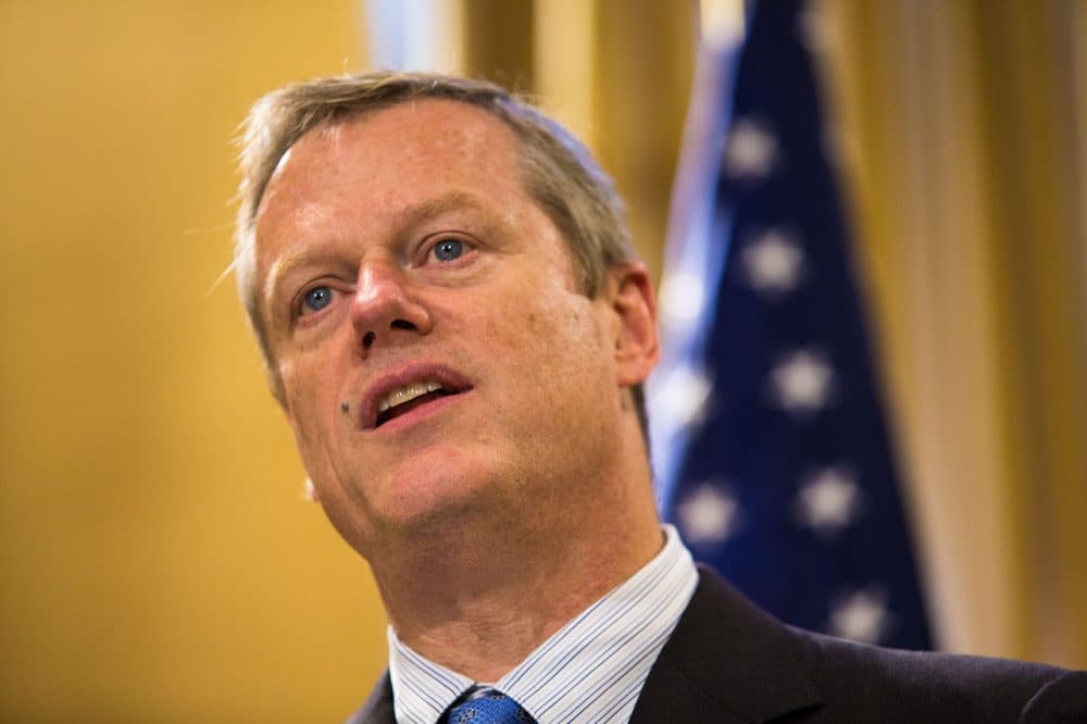 Speaking to reporters days after the Paris terror attacks, Gov. Charlie Baker said any conversation about accepting Syrian refugees &quot;has to start with whatever process the federal government is going to put in place, to vet people through that process.&quot; (Jesse Costa/WBUR File Photo)