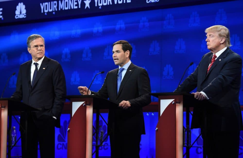 Republican Presidential hopeful Marco Rubio (C) had his breakthrough moment when he responded to fellow candidate, and one-time mentor Jeb Bush's reprimand with composure. (Robyn Beck/AFP/Getty Images)