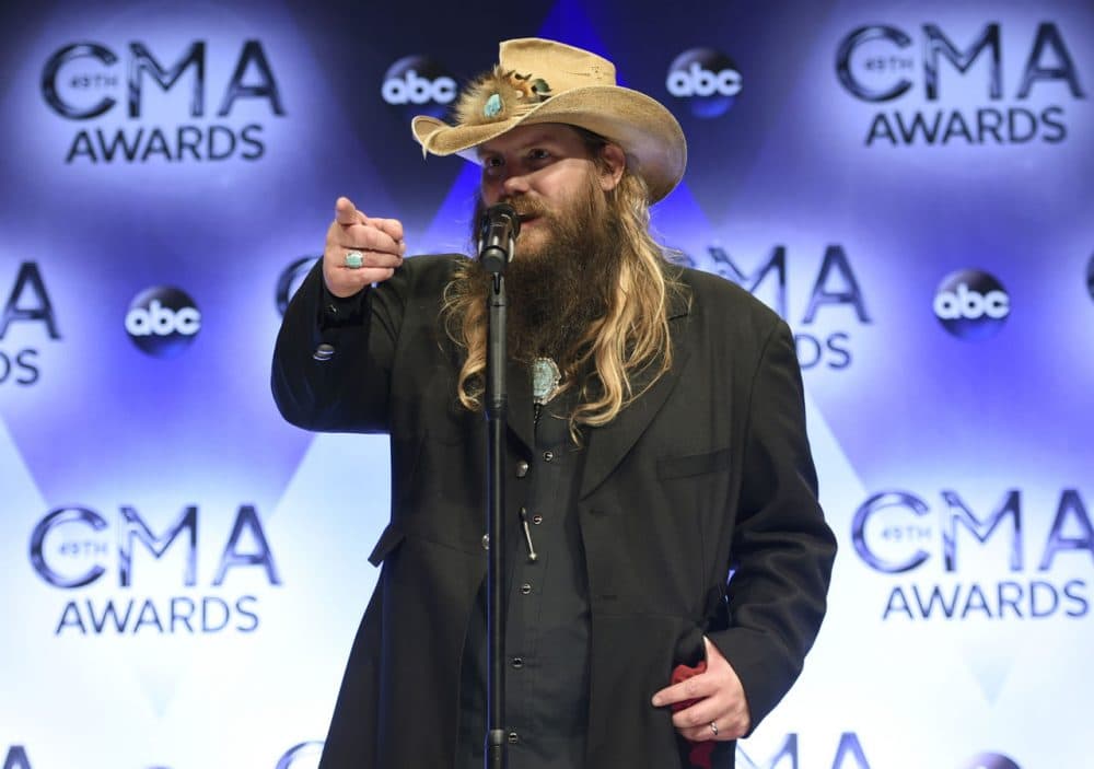 Chris Stapleton, winner of the awards for new artist of the year, album of the year for &quot;Traveller,&quot; and male vocalist of the year, participates in an interview in the press room at the 49th annual CMA Awards at the Bridgestone Arena on Wednesday, Nov. 4, 2015, in Nashville, Tenn. (Evan Agostini/Invision/AP)