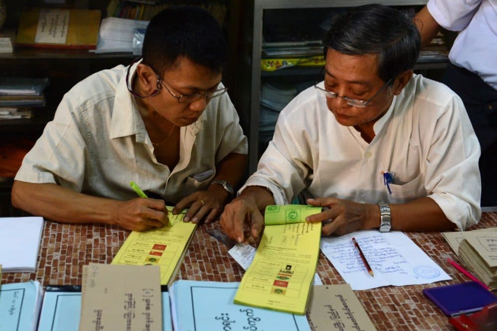 Myanmarese officials prepare ballots during advance voting in Yangon on November 6, 2015. The once junta-run nation heads to the polls on November 8 in what voters and observers hope will be the freest election in decades. While NLD party is expected to triumph at key elections this year, Myanmar opposition leader Aung San Suu Kyi's pathway to the presidency is blocked by a controversial clause in Myanmar's junta-era constitution. (Romeo Gacad/AFP/Getty Images)