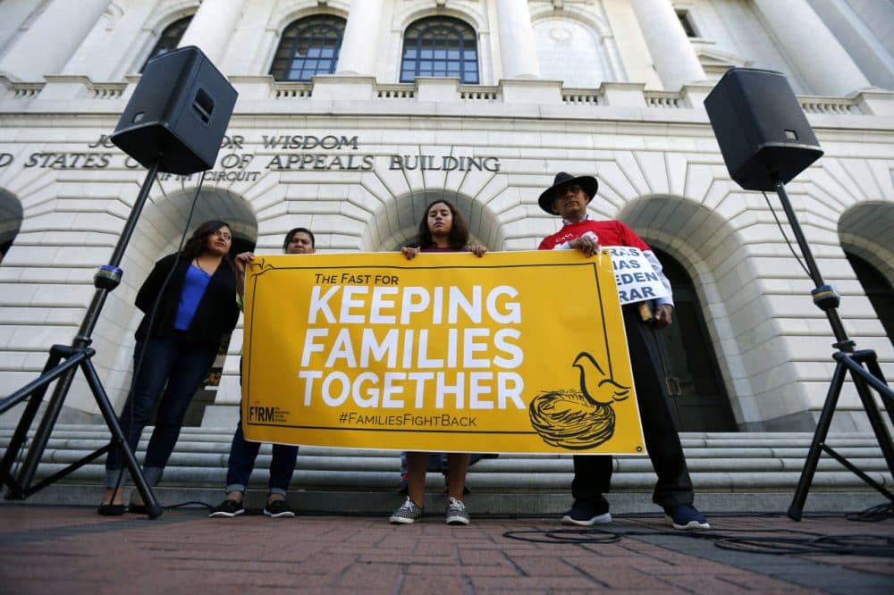 Immigration activists protest outside the federal appeals court in New Orleans, Wednesday, Oct. 14, 2015. The activists are accusing the federal appeals court in New Orleans of delaying a ruling about President Barack Obama's immigration proposal in an effort to prevent it from reaching the U.S. Supreme Court during the current term. Left to right are Nora Hernandez, of Albuquerque, N.M., Myrta Venture, of Silver Spring, Md., Mayra Jannet Ramierz, of Mountain Hope, Ark. and Miguel H. Claros, of Silver Spring. (Gerald Herbert/AP)