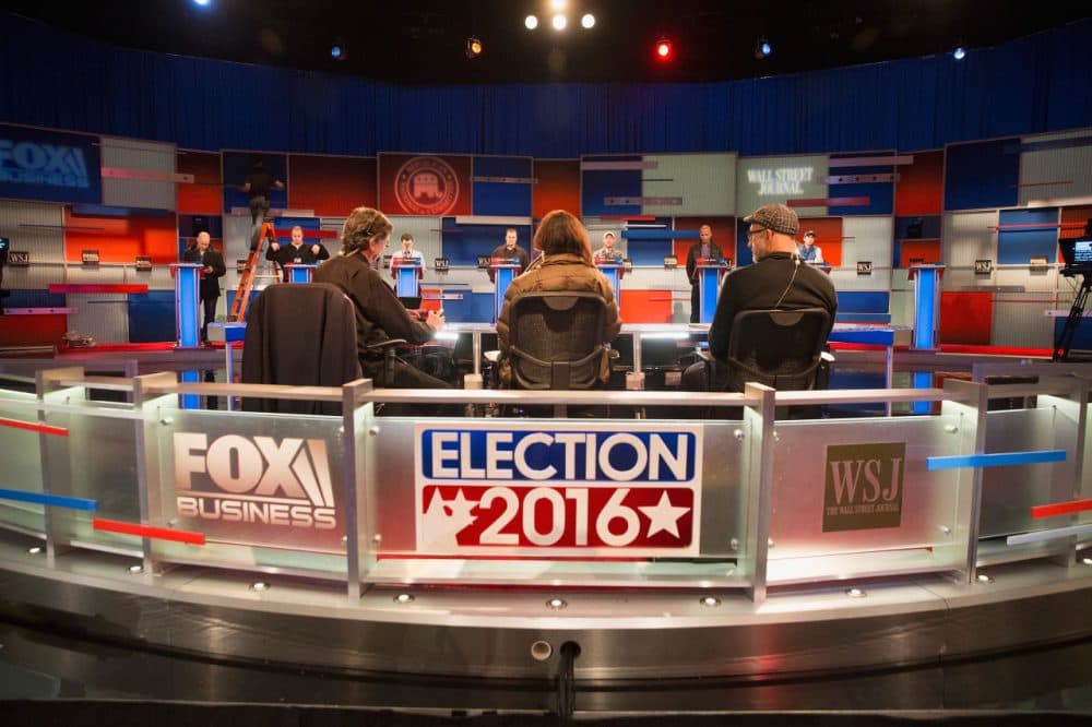 Workers test the setup at the Milwaukee Theater for the Republican presidential debate sponsored by Fox Business News and the Wall Street Journal on November 9, 2015 in Milwaukee, Wisconsin. (Scott Olson/Getty Images)