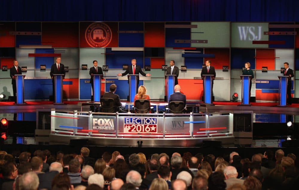 From left: Ohio Governor John Kasich, Jeb Bush, Sen. Marco Rubio (R-FL), Donald Trump, Ben Carson, Ted Cruz (R-TX), Carly Fiorina, and Sen. Rand Paul (R-KY) take part in the Republican Presidential Debate sponsored by Fox Business and the Wall Street Journal at the Milwaukee Theatre November 10, 2015 in Milwaukee, Wisconsin. The fourth Republican debate is held in two parts, one main debate for the top eight candidates, and another for four other candidates lower in the current polls. (Scott Olson/Getty Images)