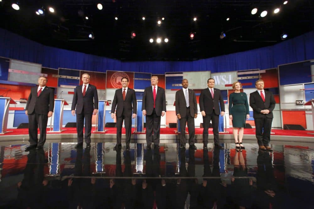 Republican presidential candidates (left to right) John Kasich, Jeb Bush, Marco Rubio, Donald Trump, Ben Carson, Ted Cruz, Carly Fiorina and Rand Paul take the stage before the Republican presidential debate at the Milwaukee Theatre, Tuesday, Nov. 10, 2015, in Milwaukee. (Jeffrey Phelps/AP Photo)
