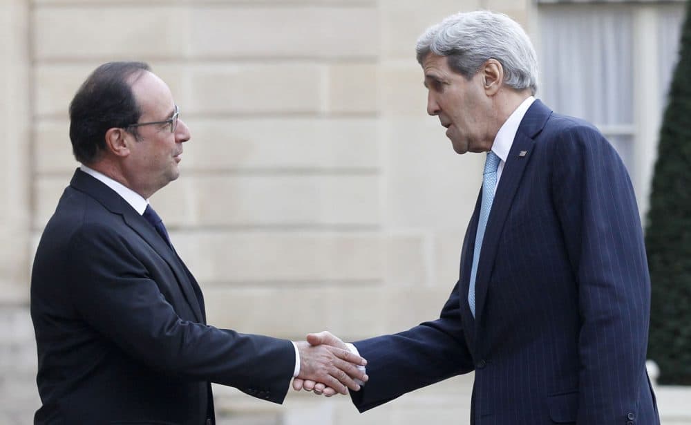 French President François Hollande (left) welcomes U.S. Secretary of State John Kerry prior to a meeting at the Élysée Presidential Palace on November 17, 2015 in Paris, France. (Thierry Chesnot/Getty Images)