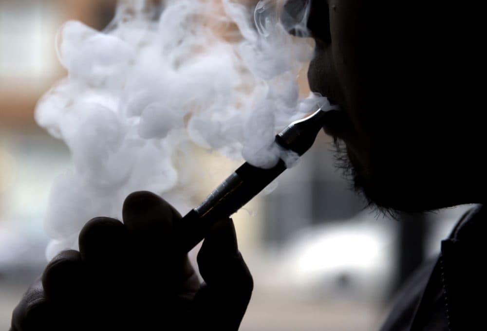 An electronic cigarette is demonstrated in Chicago on April 23, 2014. (Nam Y. Huh/AP)