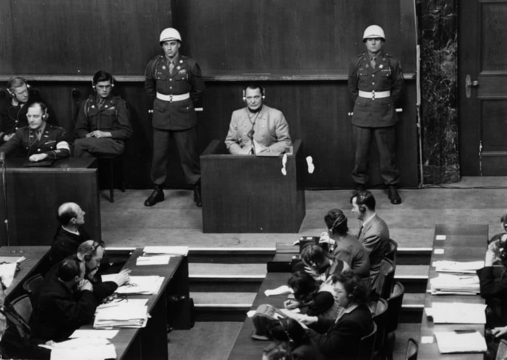 Nazi leader Hermann Goering (1893 - 1946) is pictured on March 16, 1946, in the witness box at the Nuremberg War Crime Trials, where he was later sentenced to death. (Keystone/Getty Images)