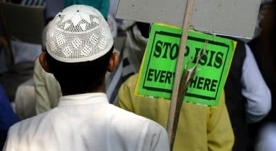 Rich Barlow: By embracing global terror, the Islamic State may have rushed into a bigger fight than it can handle. In this photo, an Indian Muslim man holds a banner during a protest against ISIS in New Delhi, India, Wednesday, Nov. 18, 2015. Multiple attacks across Paris on Friday, Nov. 13 left more than one hundred dead and many more injured. (Manish Swarup/ AP)