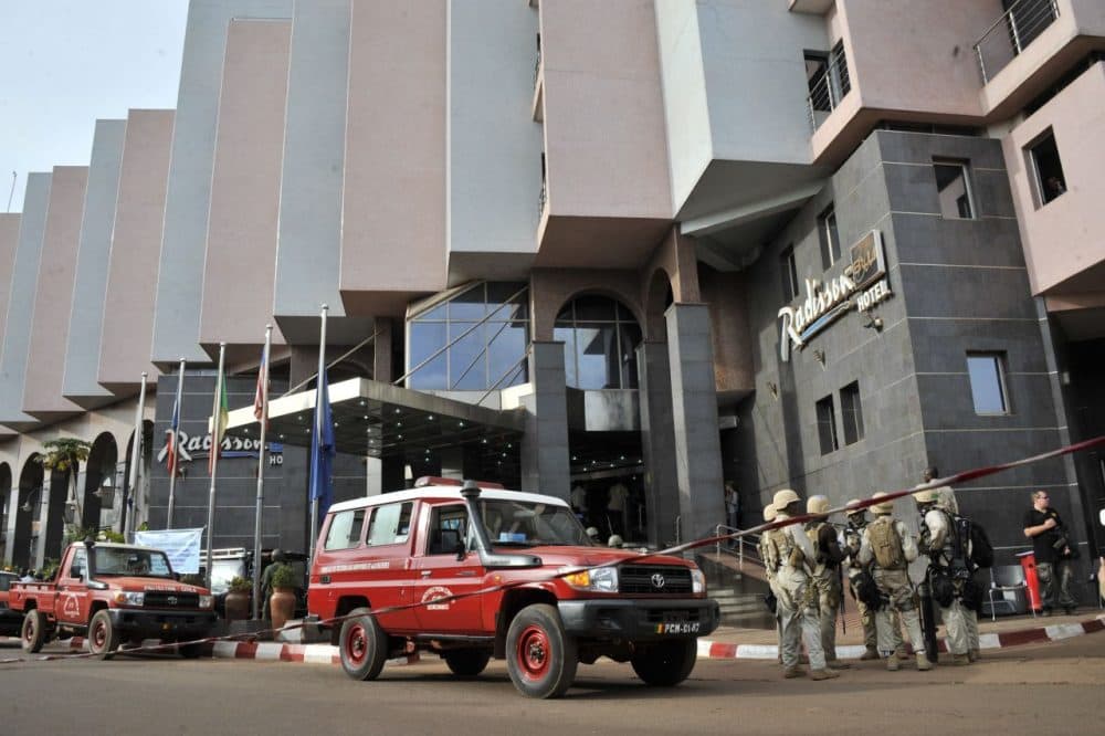 Malian soldiers and special forces stand guard at the entrance the Radisson Blu hotel in Bamako on November 20, 2015, after the assault of security forces. (Habibou Kouyate/AFP/Getty Images)