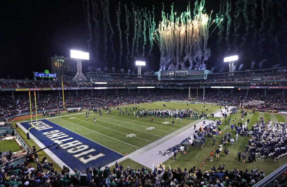 Fireworks light up the sky at the conclusion of the Shamrock Series NCAA college football game at Fenway Park in Boston Saturday. (Charles Krupa/AP)