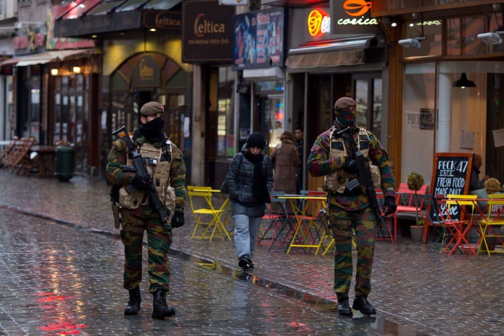 Armed policemen patrol along Rue Du Marche Aux Poulets on November 24, 2015 in Brussels, Belgium. At a press conference last night the Belgian Prime Minister Charles Michel announced that the city would remain at terror alert level four which is the countries highest threat level. The Prime Minister also announced that the public transport system and schools would re-open Wednesday.  (Ben Pruchnie/Getty Images)