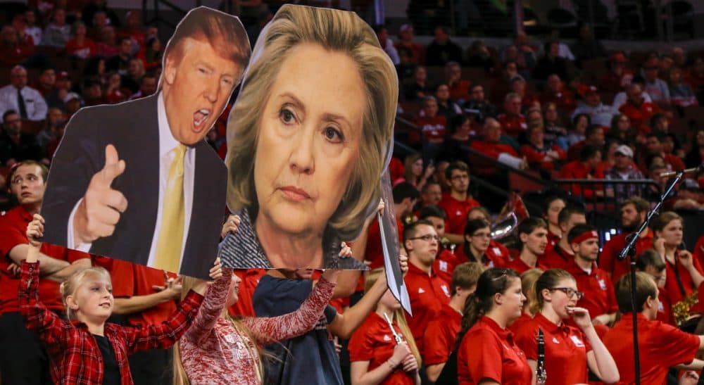 It's one year until people will vote in the 2016 presidential election. What's a Republican to do if he can't, in good conscience, support any of his party's candidates? In this photo, Nebraska fans try to distract Delaware State players with signs of Donald Trump and Hillary Clinton during the second half of an NCAA college basketball game in Lincoln, Neb., Thursday, Nov. 19, 2015. Nebraska won 75-60. (Nati Harnik/ AP)