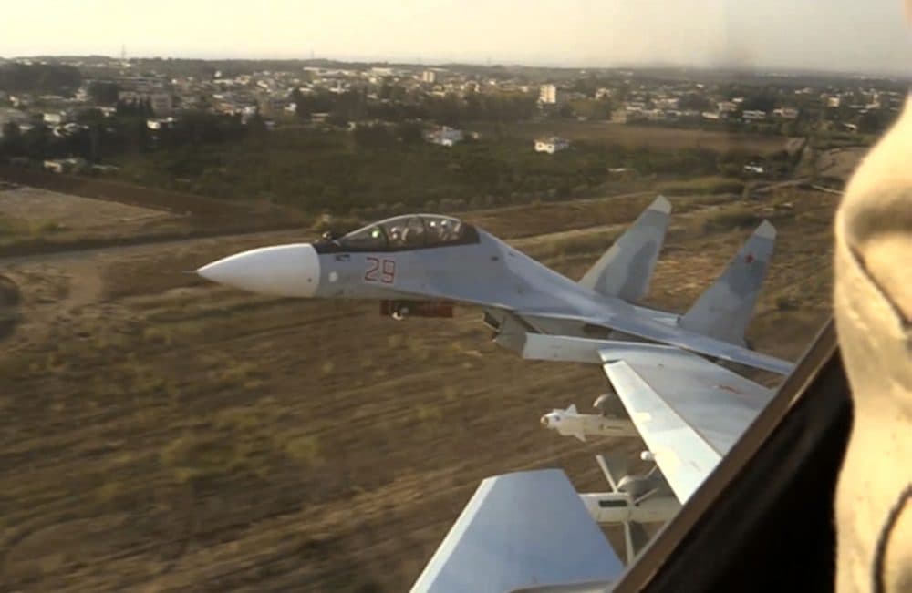 In this photo made from video made available by Russian Defense Ministry official website on Friday, Nov. 20, 2015, Russian air force Su-30 fighter jets take off from the Hemeimeem air base in Syria as part of a Russian air campaign against target in Syria, according to information provided by Russian Defense Ministry. Russian long-range bombers and navy ships have launched 101 cruise missiles in four days, including 18 fired by Russian navy ships from the Caspian Sea on Friday, according to information released by Russian Defense Ministry. (Russian Defense Ministry Press Service/AP)