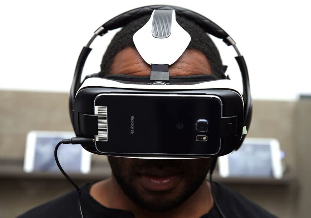 A man tries out the 360-degree &quot;The Hunger Games - Virtual Reality Experience,&quot; using the Samsung Gear VR, October 8, 2015 in New York City.  (Neilson Barnard/Getty Images for Samsung)