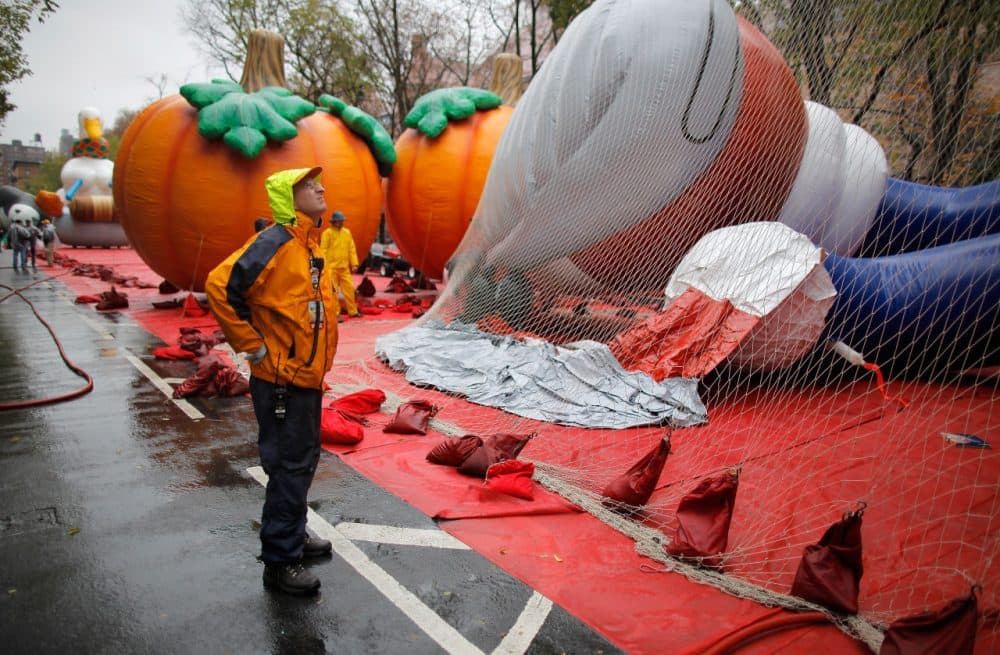 Vice president of Macy's Parade Studio John Piper directs operations as float handlers inflate and secure a Sonic the Hedgehog float during 85th annual Macy's Thanksgiving Day Parade Inflation Eve on November 23, 2011 in New York City.  (Jemal Countess/Getty Images)