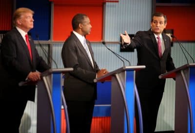 Republican presidential candidate Donald Trump (left) and Ben Carson (center) look on as U.S. Sen. Ted Cruz (R-TX) speaks during the Republican Presidential Debate sponsored by Fox Business and the Wall Street Journal at the Milwaukee Theatre on November 10, 2015, in Milwaukee, Wisconsin. (Scott Olson/Getty Images)