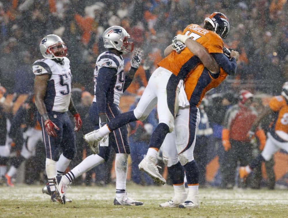 Denver Broncos quarterback Brock Osweiler (17) celebrates his touchdown pass against the New England Patriots during the second half of an NFL football game on Sunday in Denver. (Joe Mahoney/AP)