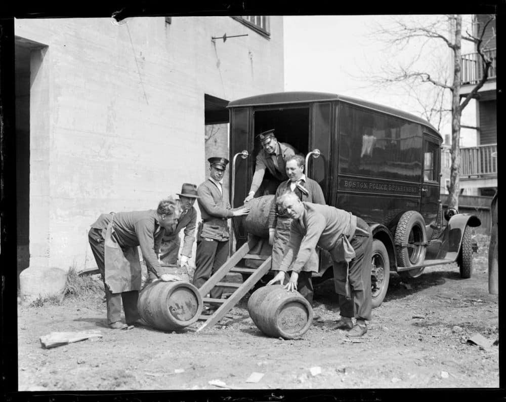 Police from Boston's Division 9 with casks seized during Prohibition, circa 1930. (Boston Public Library/flickr)