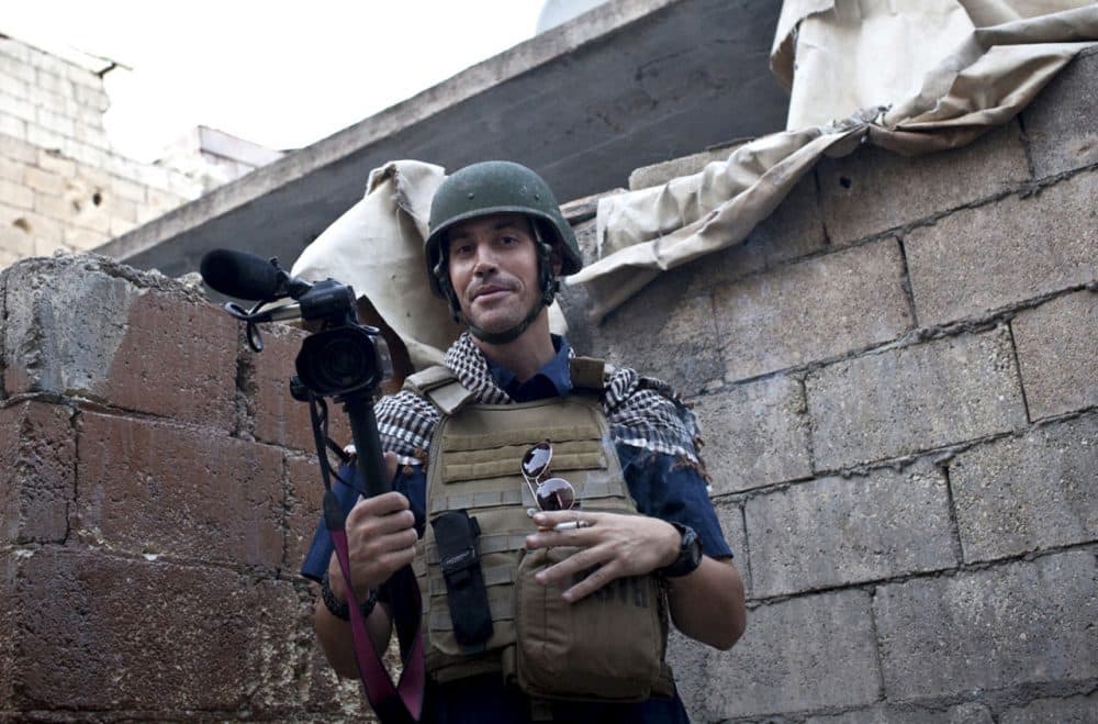 This November 2012 photo shows New Hampshire journalist James Foley covering the civil war in Aleppo, Syria. (freejamesfoley.org/Nicole Tung/AP File)