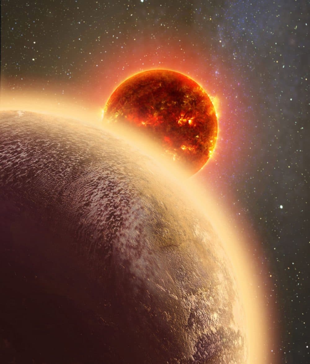 This artist's conception shows GJ 1132b, a rocky planet similar to the Earth in size and mass, orbiting a red dwarf star. (Dana Berry/SkyWorks/NASA via AP)