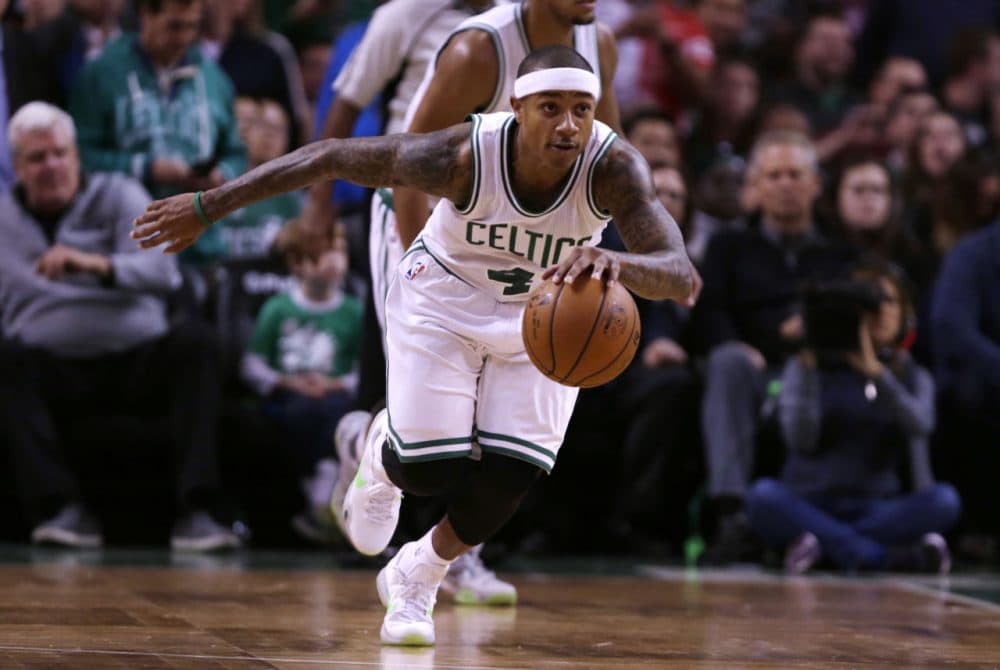 Boston Celtics guard Isaiah Thomas drives during the second half of a game in Boston on Friday, Nov. 13, 2015. (Charles Krupa/AP)