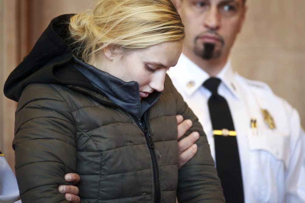 Abigail Hanna stands during her arraignment Monday at Newburyport District Court. (Dina Rudick/The Boston Globe/Pool)
