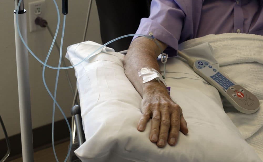 A new report from the Deprtment of Public Health and Massachusetts Cancer Registry looks at rates of cancer incidence and mortality in the Commonwealth. (AP Photo/Gerry Broome)