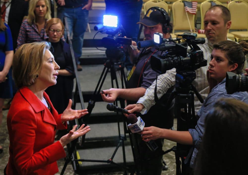 Carly Fiorina, in Iowa on Friday, responds to the press. She and other GOP candidates are being asked to discuss their foreign policy positions in light of the attacks on Paris. (AP Photo/Nati Harnik)