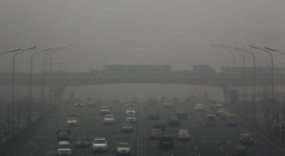Buses and cars are clogged with heavy traffic on the roads on a heavily polluted day in Beijing, Monday, Nov. 30, 2015. Beijing on Sunday, Nov. 29 issued its highest smog alert of the year following air pollution in capital city reached hazardous levels as smog engulfed large parts of the country despite efforts to clean up the foul air. (Andy Wong/ AP)