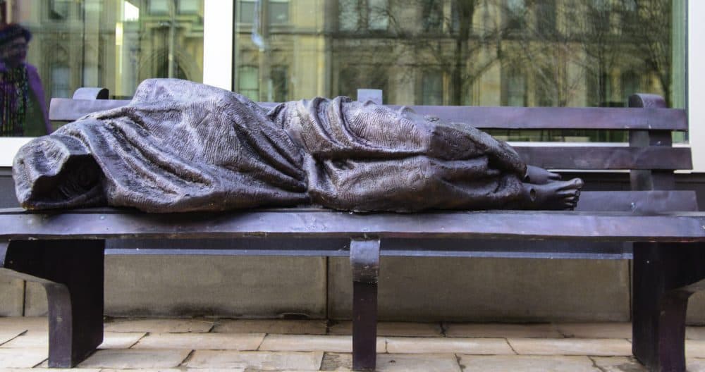 A homeless Jesus statue outside Regis College, a theological college at the University of Toronto, Canada. (Michael_Swan/Flickr)
