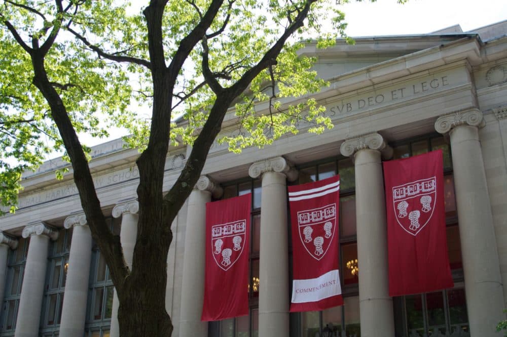 The Harvard Law School seal can be seen on banners decorating the library for commencement in May 2011. (nkcphoto/Flickr)