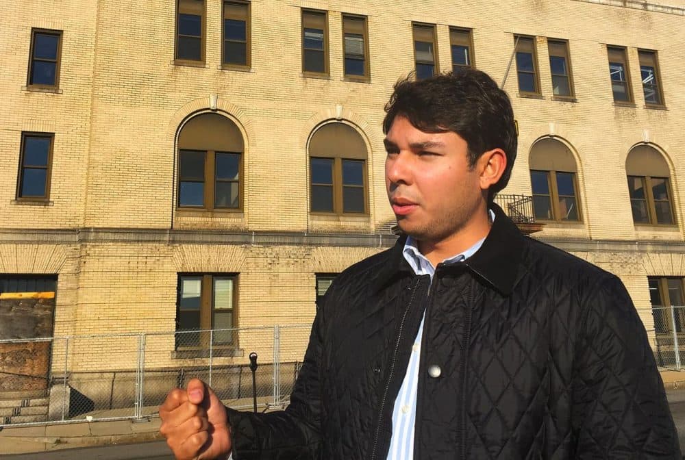 Jasiel Correia stands in front of the city’s former police station, in this 2016 file photo. (Simon Rios/WBUR)